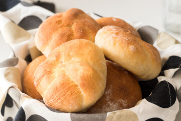 Freshly baked homemade buns in a basket