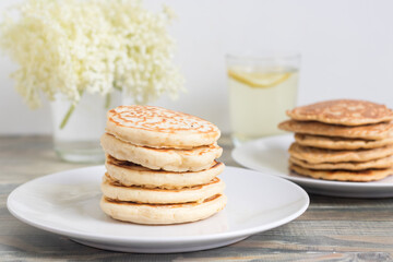 Pile of pancakes baked with elder flower