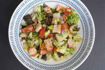 A colorful Arabic Fattoush salad served in a dish