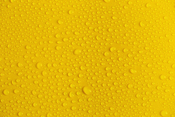 Rain or Water drops on yellow background