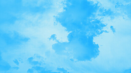Fototapeta na wymiar Beautiful bright blue clouds in a light blue sky, 16:9 panoramic format