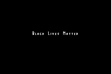 Black Lives Matter white text on poster in the middle of black background
