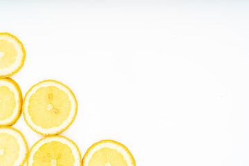 Fresh lemon slices with leaves isolated on white background.