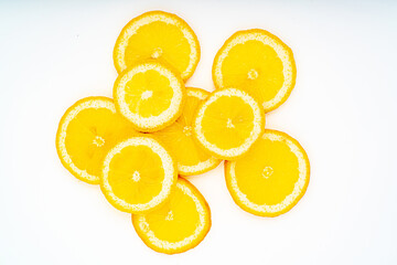 Fresh lemon slices with leaves isolated on white background.