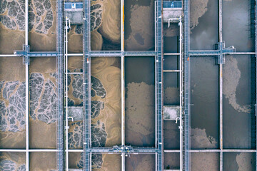 Sewage Farm Aerial View. Clarifying tanks and green grass. Top view of sewage treatment plant....