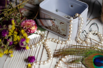 vintage box on the table with pearl jewelry