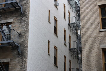 Fototapeta na wymiar Upper East Side Churches Buildings Homes Balconies Lights Windows