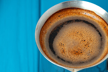 Close up of coffee in metal turk