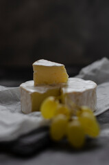 Camembert cheese with grapes