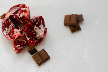 chopped pomegranate with dried apricots and chocolate