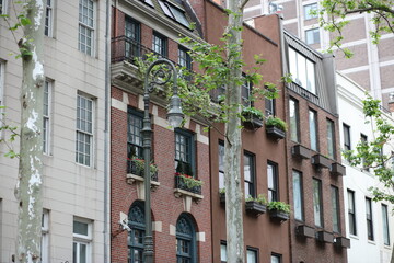 Fototapeta na wymiar Upper East Side Churches Buildings Homes Balconies Lights Windows