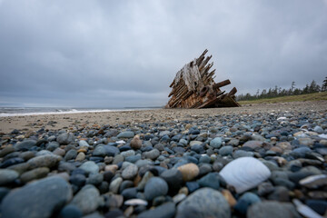 The famous and popular Pesuta Shipwreck on a cloudy day giving it a dark and dramatic effect. The wreck is located on the East Beach in Naikoon Provincial Park, Haida Gwaii British Columbia, Canada