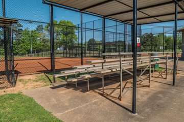 Empty bleachers at a baseball park