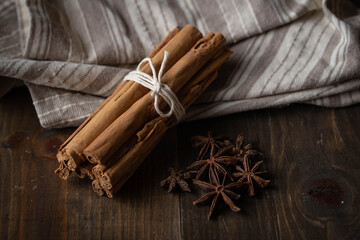 cinnamon and star anise on wooden background