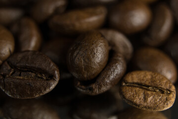 Fragrant fried coffee beans. close-up texture