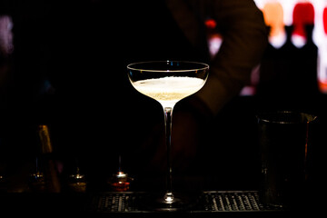 glass of champagne on a black background