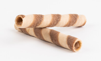 Crispy cream filled wafer roll sticks isolated on white background