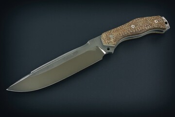 Large knife with a fixed blade. Designer knife. Fulltag knife.