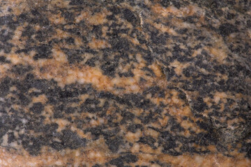 The texture of a granite stone, close-up. Background.