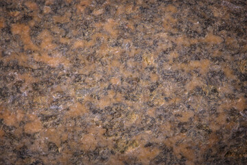 The texture of a granite stone, close-up. Background.