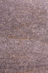 The texture of a gray stone, close-up. Background.