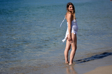 the pregnant girl on the beach