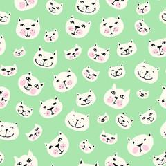 Seamless pattern with smiling cat faces. Vector illustration.