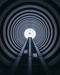 Look up Architecture symmetry cycle building with the plane on center