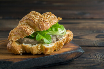 homemade meat pate on croissant