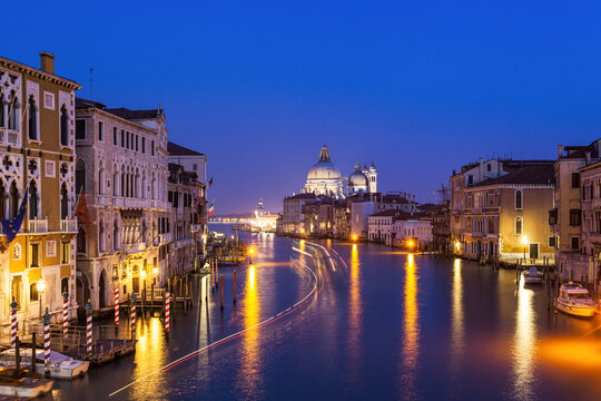 View of Venice Grand Canal and Santa Maria della Salute church in evening. © Irina Ermakova