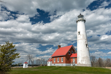 Fototapeta na wymiar Tawas Point Lighthouse on Lake Huron in Northern Michigan