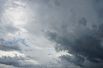 Dark sky and black clouds before rainy, Dramatic black cloud and thunderstorm, gray nimbostratus cloud bakground. 