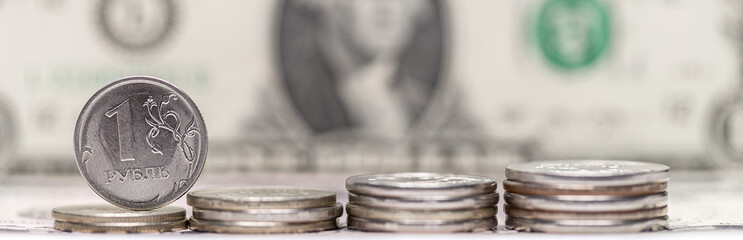 Conception finance and bidding, fall and height exchange rate ruble and dollar on stock market due to falling oil prices. Money, coins and banknote background. World financial crisis, panoramic banner