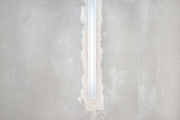 Aluminum profile for LED lighting placed in the ceiling in a newly built house.