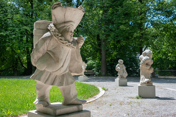 Dwarf statues in Dwarf Garden. Mirabellgarten or Mirabell garden is garden of Mirabell Palace in...