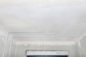 Aluminum profile for LED lighting placed in a wall with cement-lime plaster that goes into the...