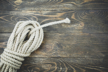 linen rope on a wooden background