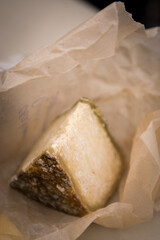 Heads of cheese. Hard cheese. Cheese. Cheese Festival. Craft cheese. A piece of hard cheese. 