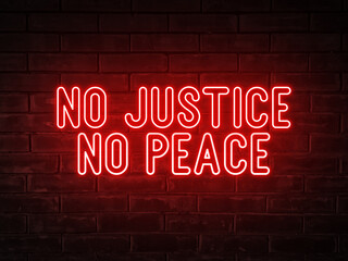 Fototapeta na wymiar No justice, no peace - red neon light word on brick wall background