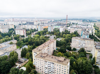 Aerial view of town with socialist soviet panel building at cloudy day. Buildings were built in the Soviet Union now Ukraine. The architecture looks like most post-soviet commuter towns.
