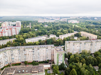Aerial view of town with socialist soviet panel building at cloudy day. Buildings were built in the...