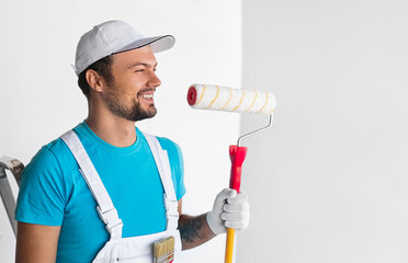 Confident painter with professional tools