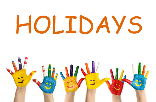 School holidays. Children with painted palms on white background, closeup