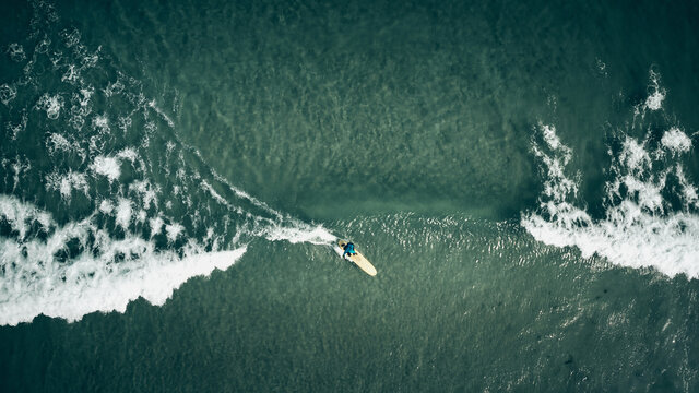 surfing sandy beach from above