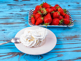 Fresh ripe strawberries and whipped cream