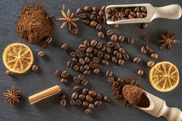 Fototapeta na wymiar Espresso coffee beans for cup of dark caffeine breakfast on black cafe food or drink background. Morning energy concept and cheerfulness or evening refreshment. Copy space, top view