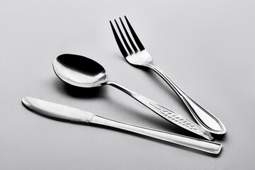 Isolate metallic cutlery set in white background
