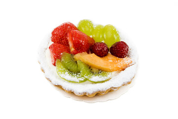 Fruit cake with various fruits isolated on white background