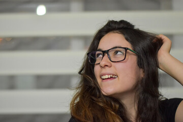 girl with glasses and black blouse