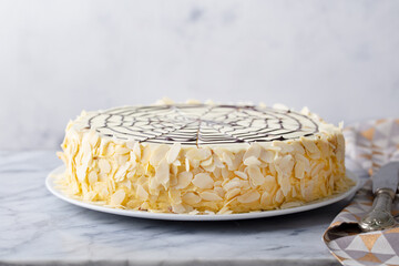 Traditional Hungarian Esterhazy cake, torte. Marble background. Close up. Copy space.